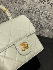 CHANEL- With Handle