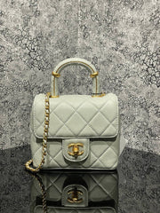 CHANEL- With Handle