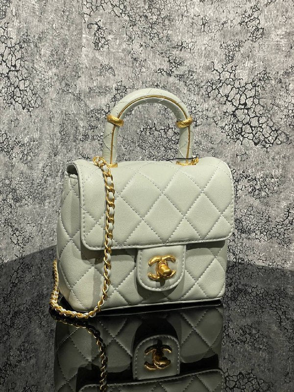 CHANEL- With Handle